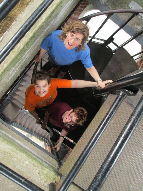 Girls looking up at stairwell